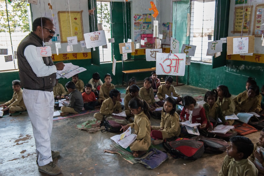 Bal teaches students in his classroom using Literacy Boost methods