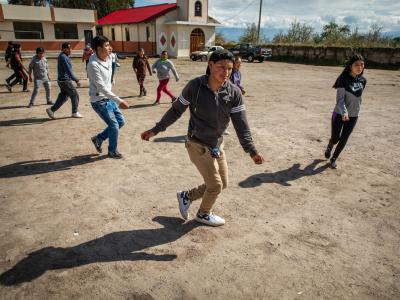 Daniel, sponsored child in Peru, dances with the dance group he helps lead
