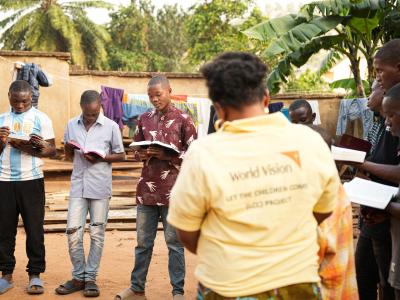 In Beni, orphaned children participate in one of 120 Bible study clubs supported by World Vision, where they find comfort and hope through sharing and meditation.