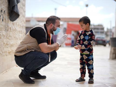 The WASH team reminds Syrian refugee children of the handwashing steps