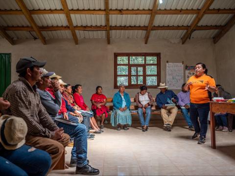 Telma, World Vision staff member in Honduras teaches a class to community members