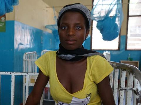 Melise at the hospital where her baby is being treated for malaria.