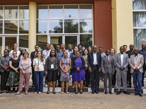 Staff pose for a picture at World Vision's EA GAM/HEA forum in Kigali