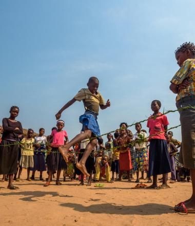 Children jumping rope in Africa