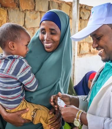 Ambiya Abdirahmah Abdimoor, 40, is pleased with how much healthier her son, Abdirahman Hassan, 1 ½, is a diet of RUTF. She brought him back to the Darusalam Mother and Child Health Center in Baidoa, Somalia, because of an ear infection.