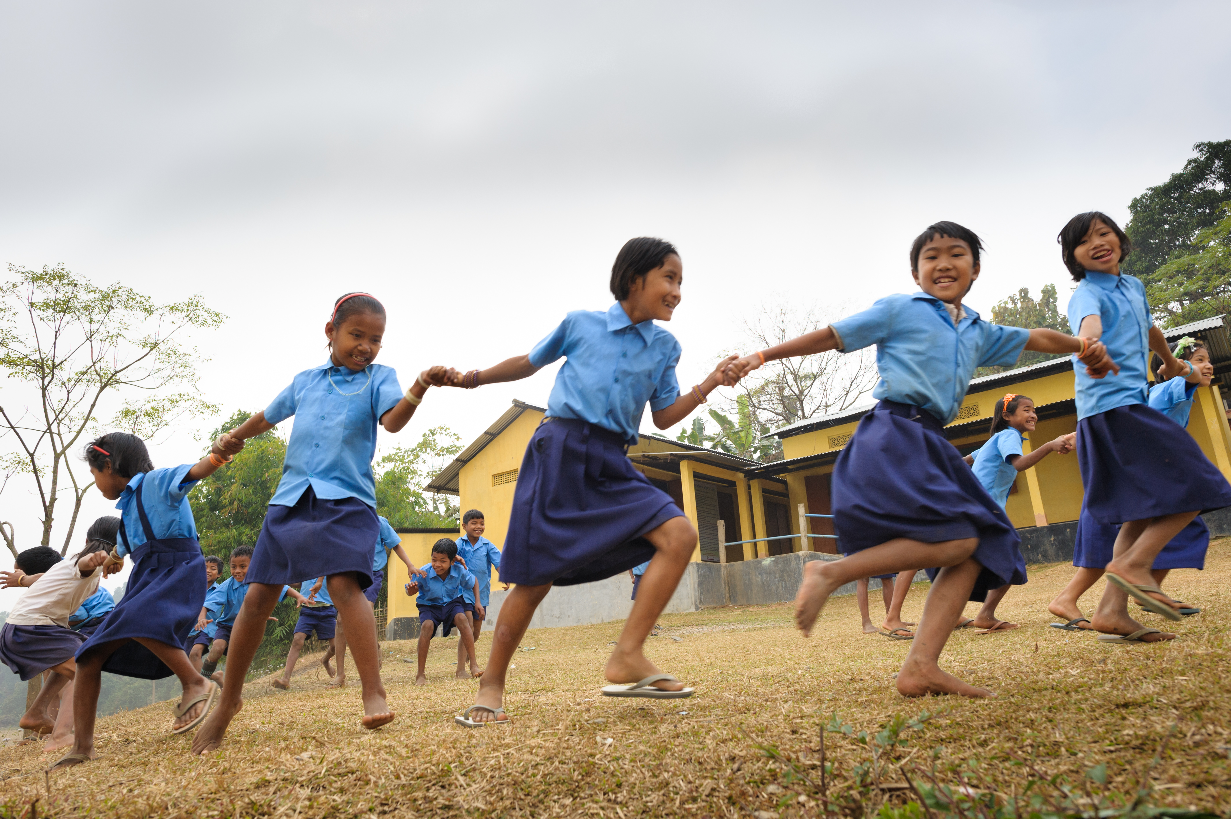 When in the village. Suburban children. Fanfare of adolescence. It in Village. Running Village children.