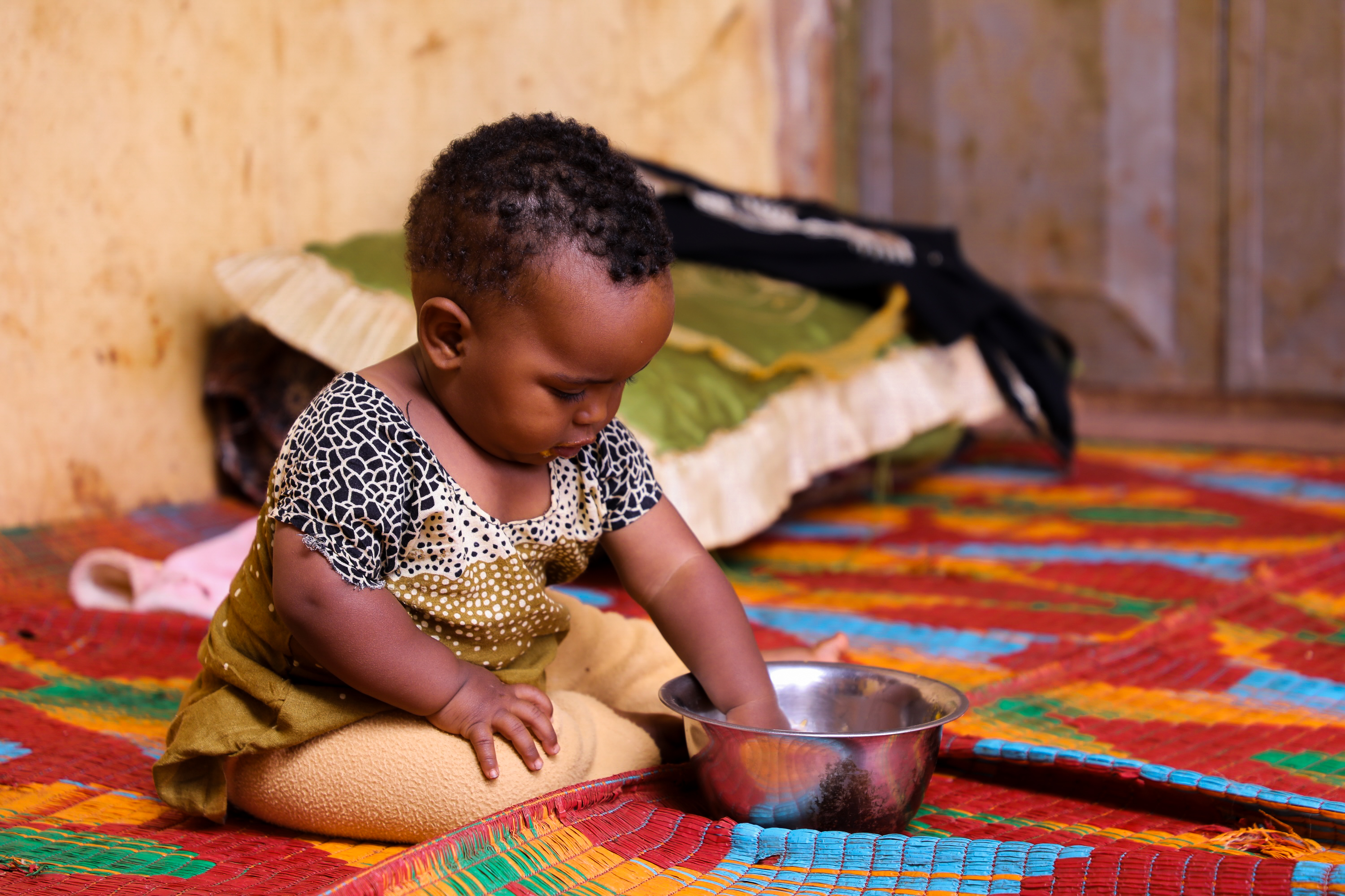 Milki eating food at her house