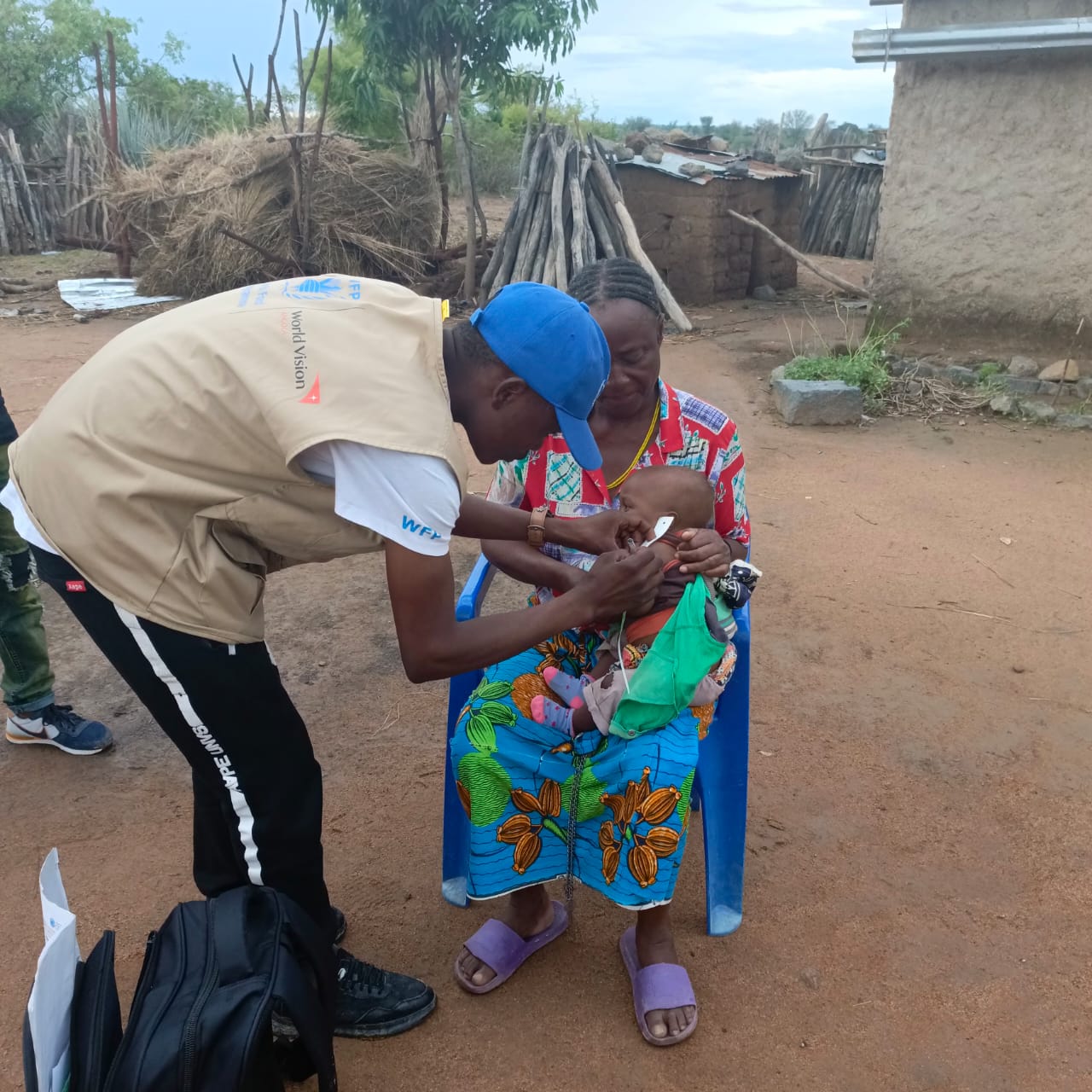 A Health Agent conducts door-to-door nutritional screening.