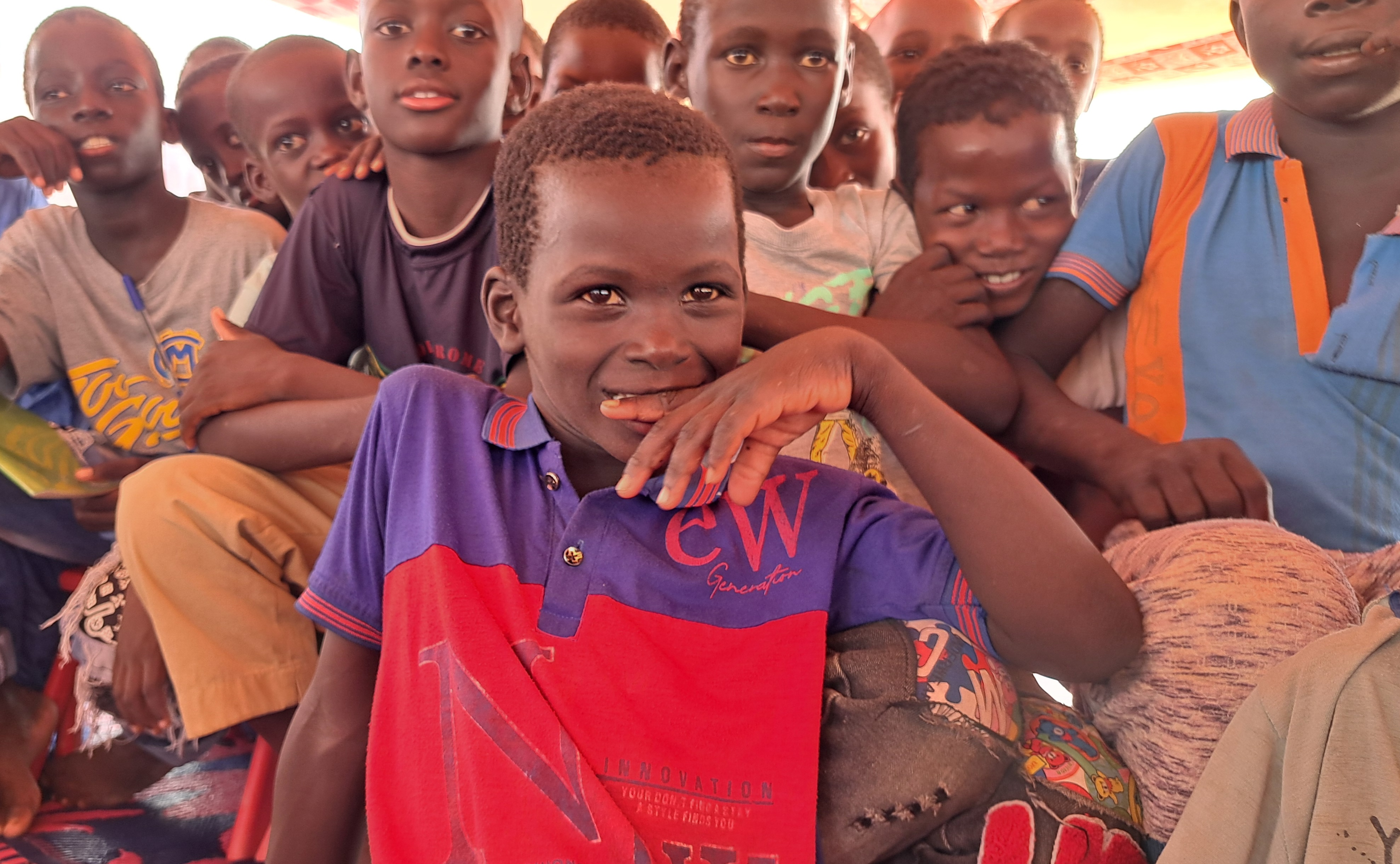 Children of Maghtafera's catch-up session smiling.