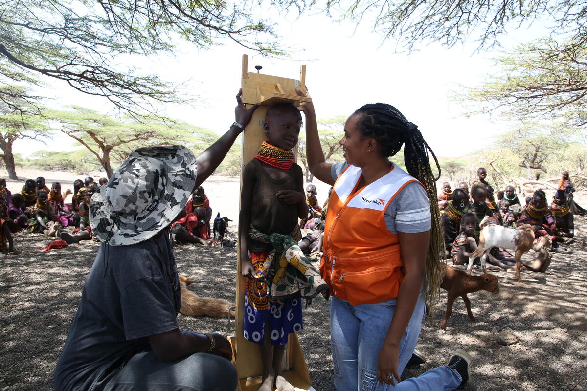 Everlin working with  community members in Marsabit Kenya 