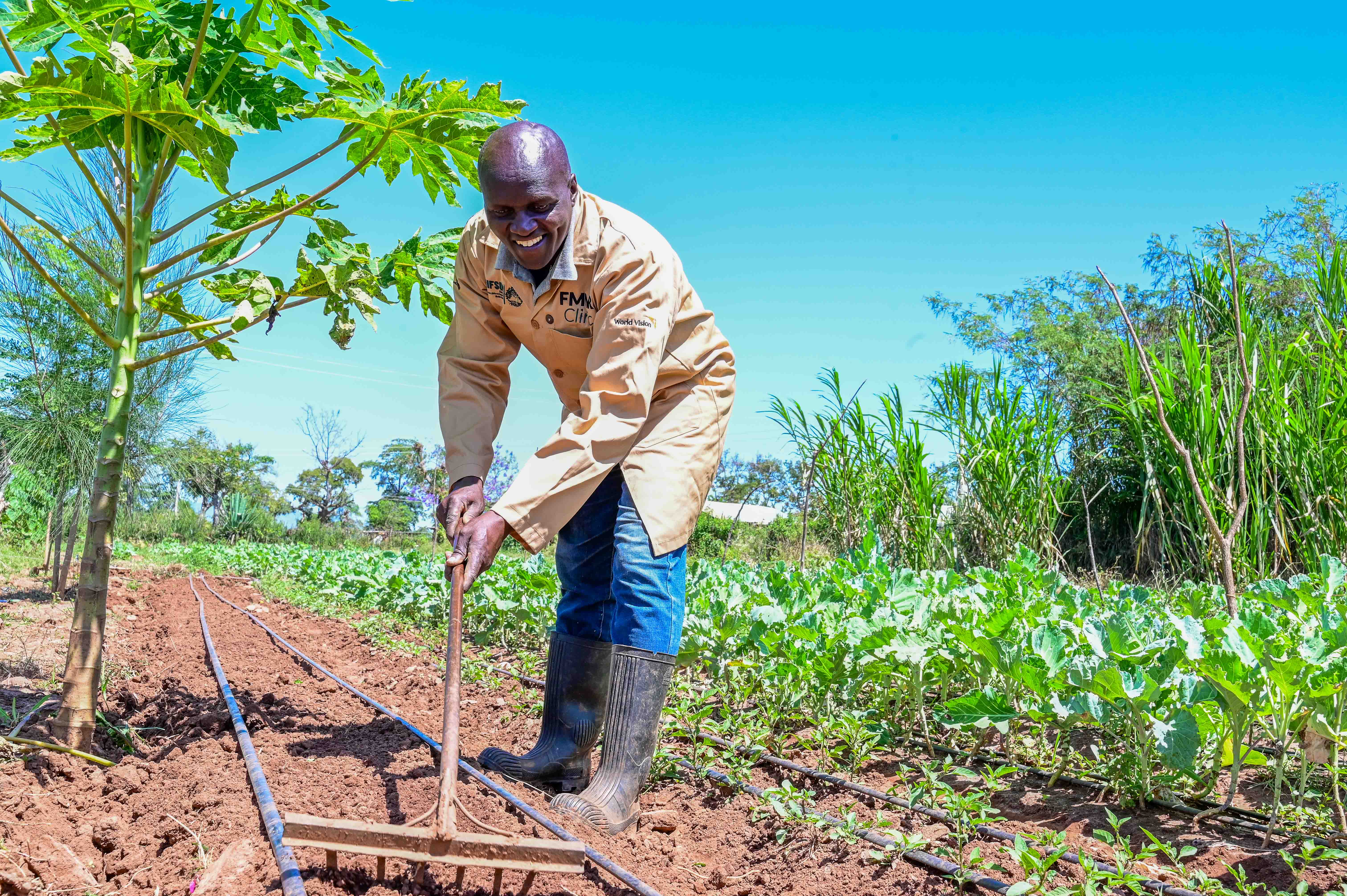 Julius has not bought vegetables for the past two years since he gets them from his farm where he has sufficient water supply for irrigation even in the dry season. ©World Vision Photo/ Hellen Owuor