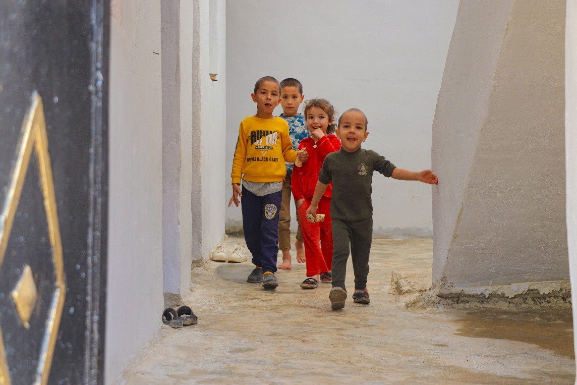 Figure 4: Badr and his siblings finally entering their renovated home