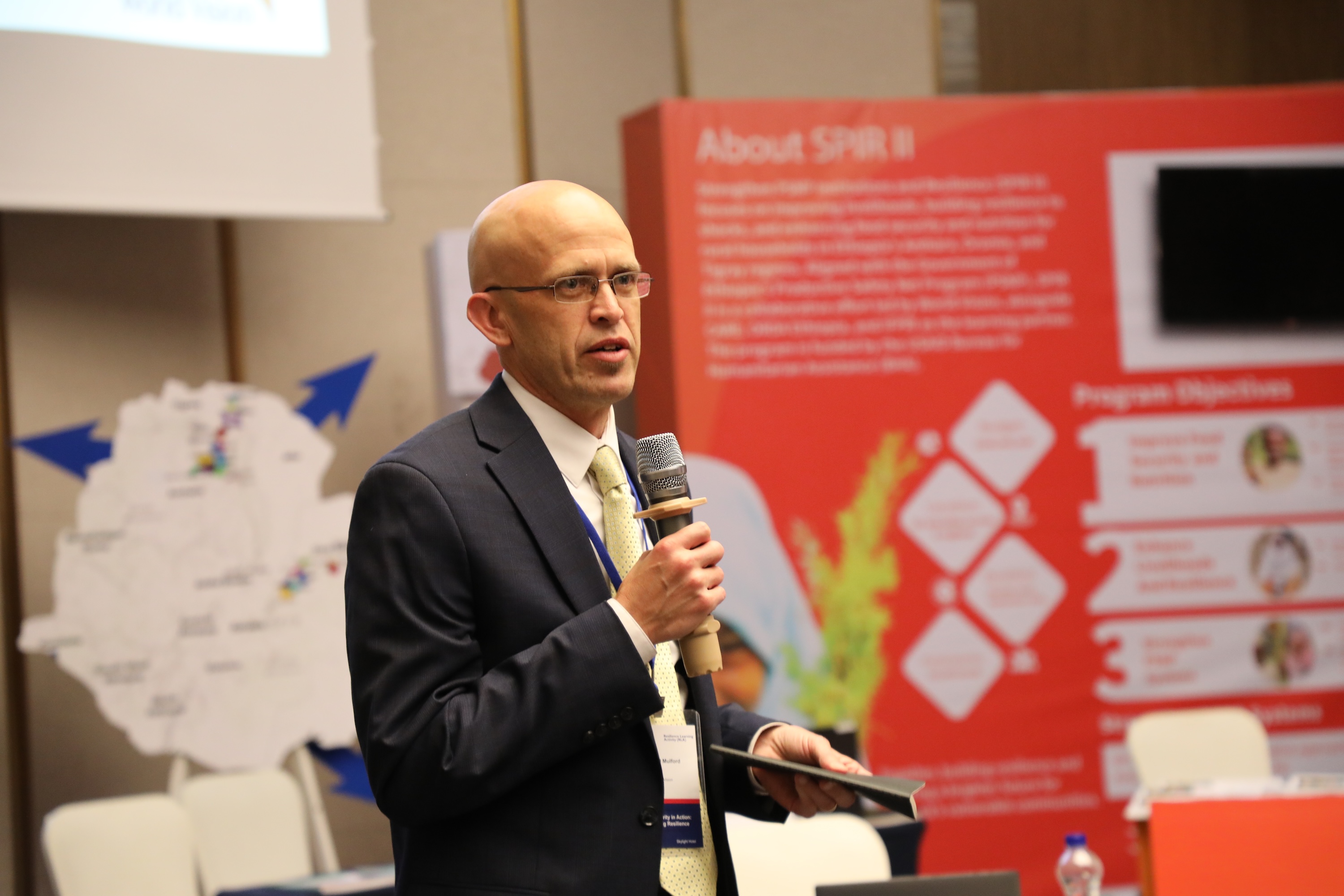 Dr. Michael Mulford, SPIR II's Chief of Party, presenting at the Food Security in Action: Building Resilience in Ethiopia event on December 12, 2024