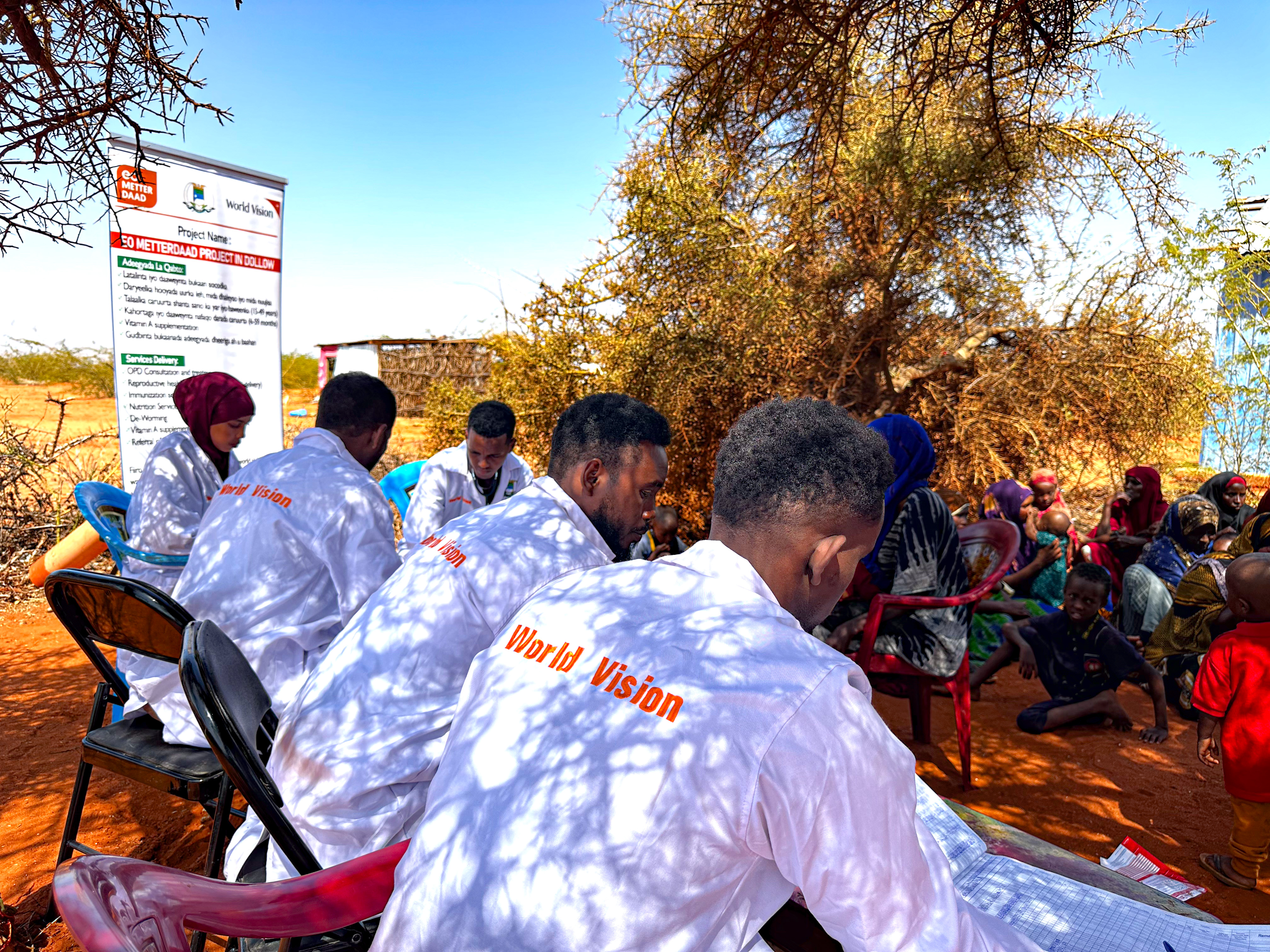 World Vision mobile clinic team providing life-saving treatment for the community in Xuansaley IDP camp