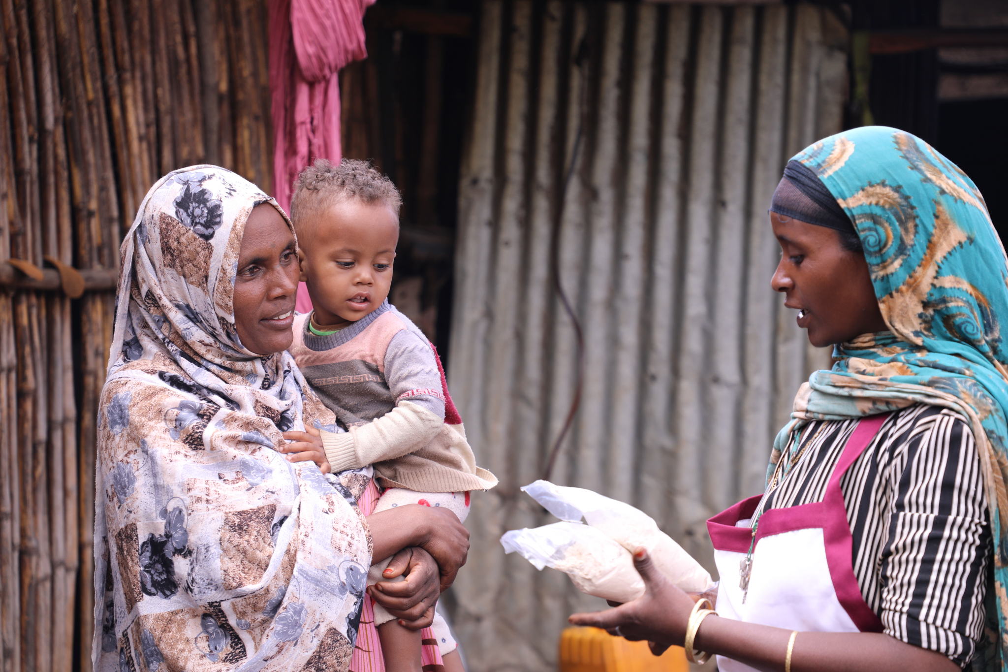 Sadia selling the mixed flour to Marima