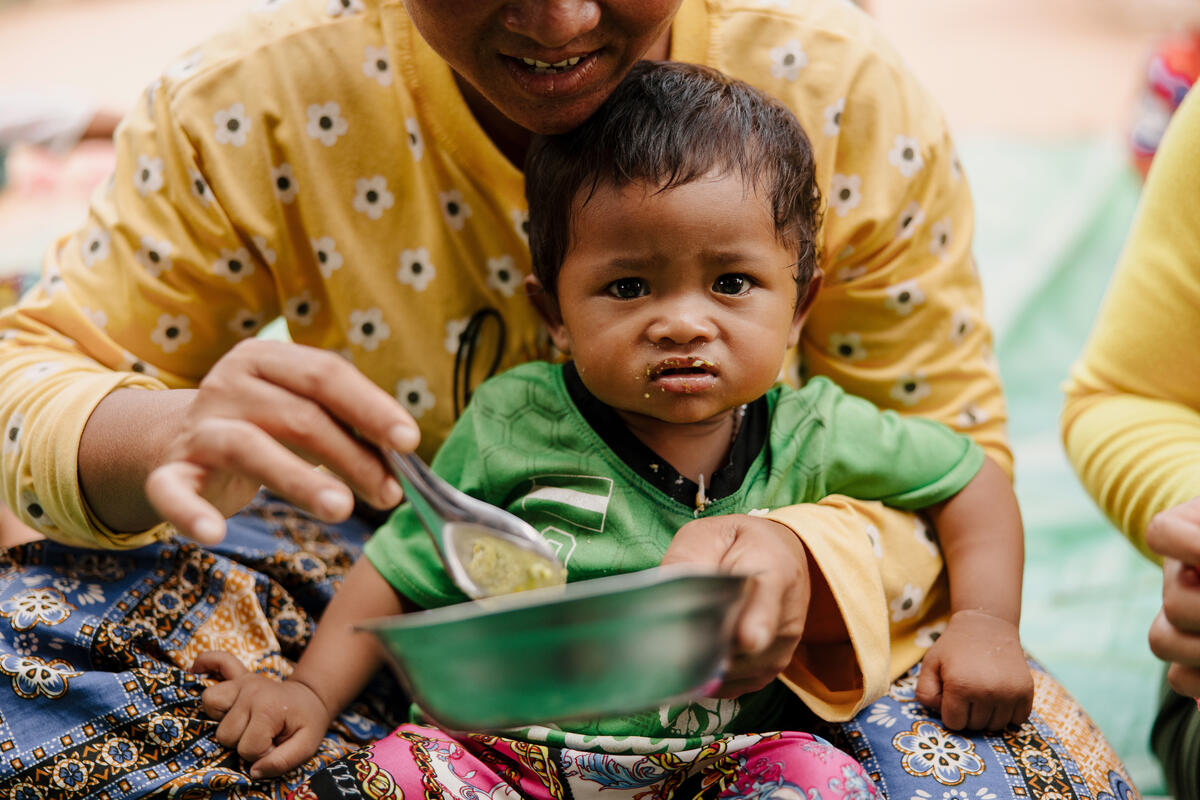 Cambodian child eating