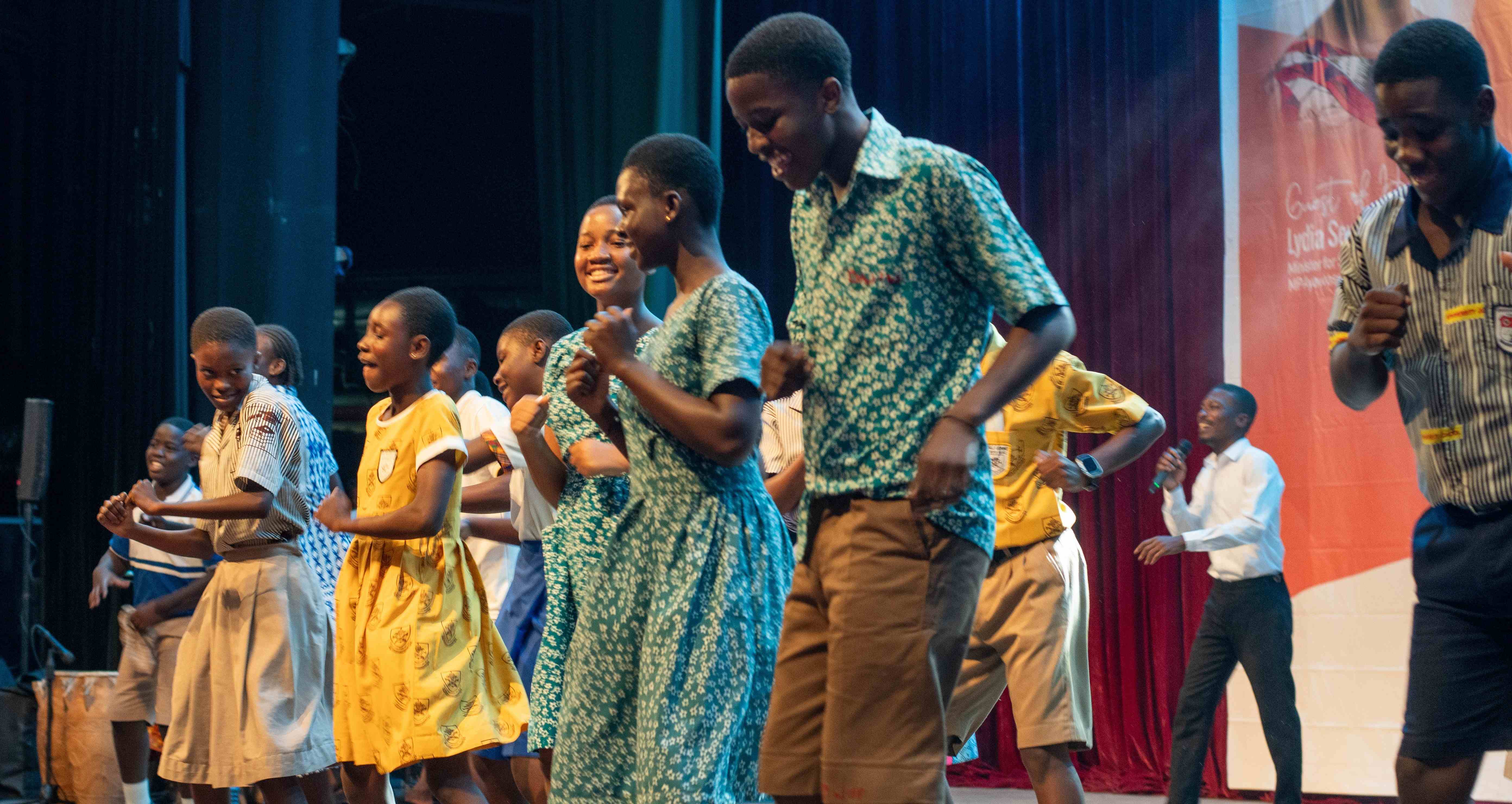 Children dancing at the sanitation fair