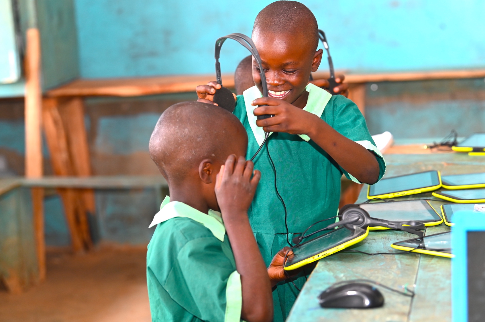 Children in Western Kenya delight in the diverse tutorials and e-learning materials they can access, all thanks to World Vision's digital learning literacy project. ©World Vision Photo/Allan Wekesa.