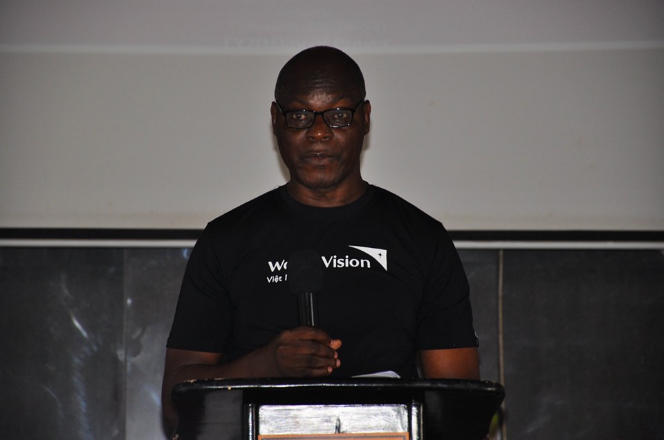 Dickens Thunde, National Director, addressing staff