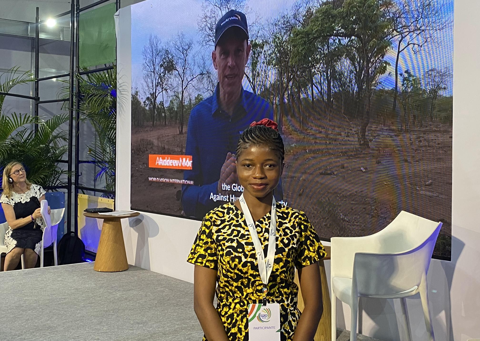 Emmanuella during Andrew Mole's speech to the G20 Global Alliance meeting