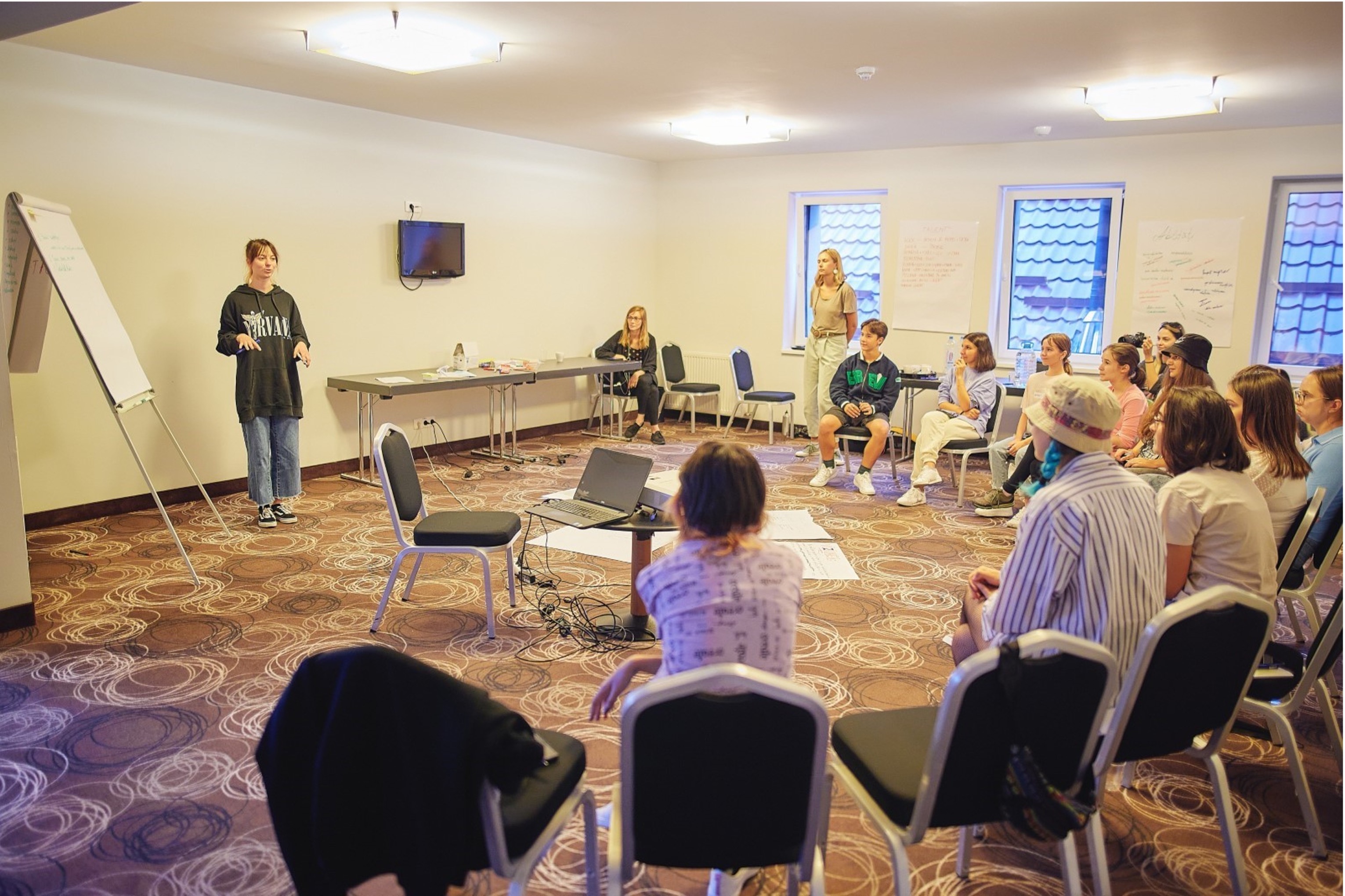 Georgiana leading a classroom of students