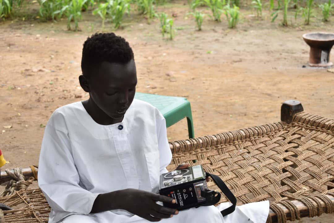 13-year-old Nouraldin and his family in Sudan's Blue Nile state, tune into the local radio station for news about COVID-19 so that they can prevent risk of infection. 