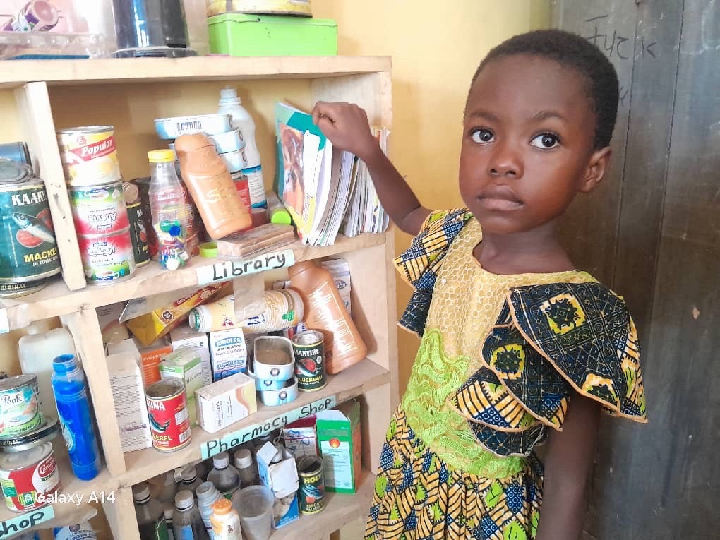 A girl in her reading corner in Ghana