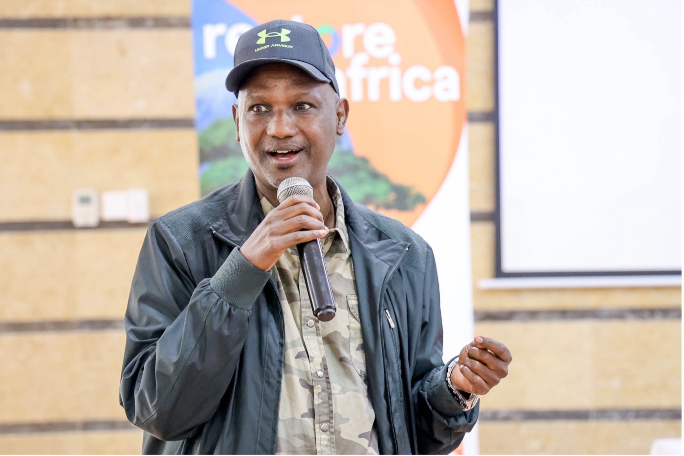 Hon. Godana Doyo, Chairperson of the National Environmental Complaints Committee (NECC), addresses participants at the RESAf workshop in Nairobi. © World Vision Photo/Felix Pilipili