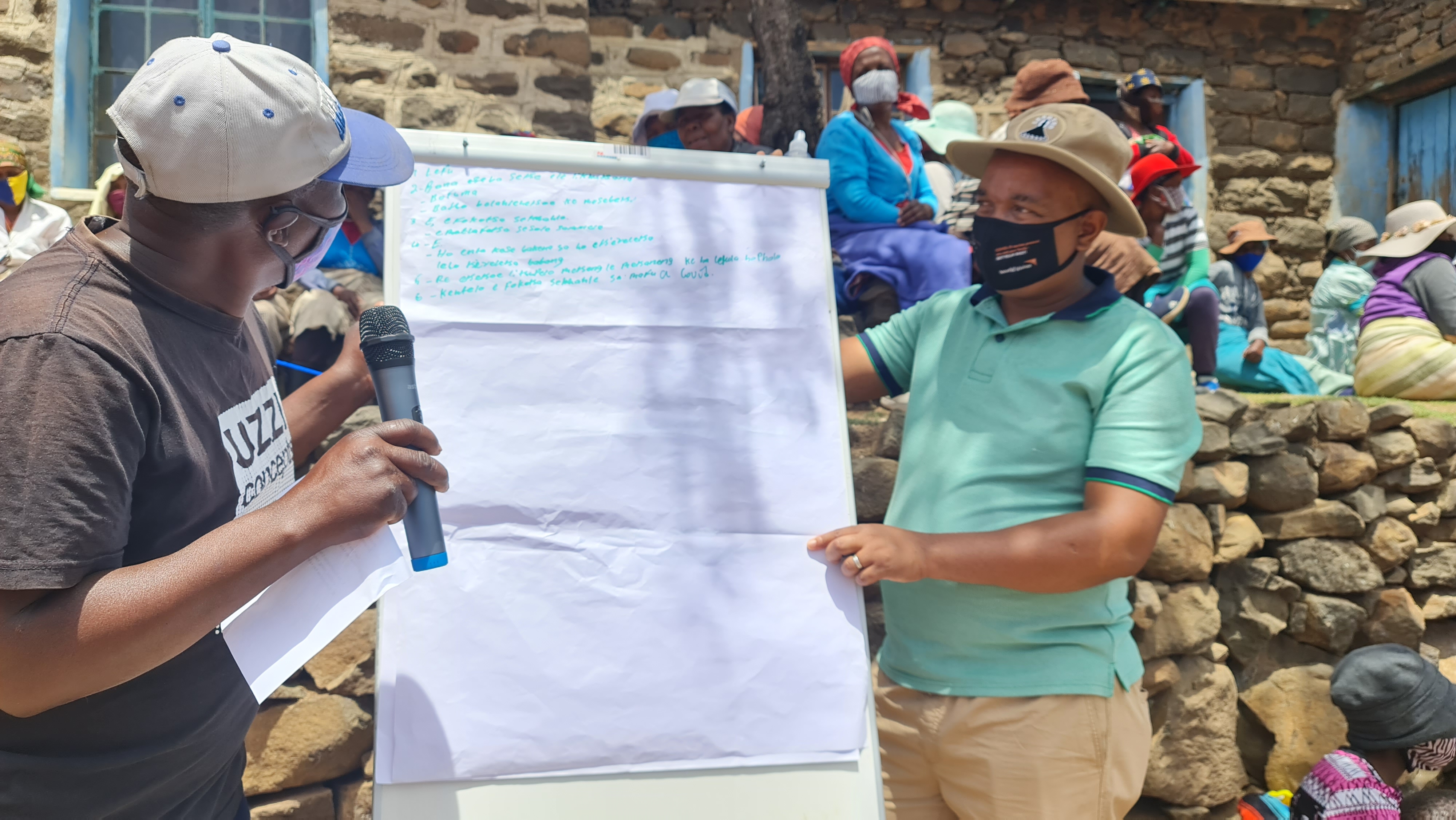 Bonga Mzini (in turquoise shirt)