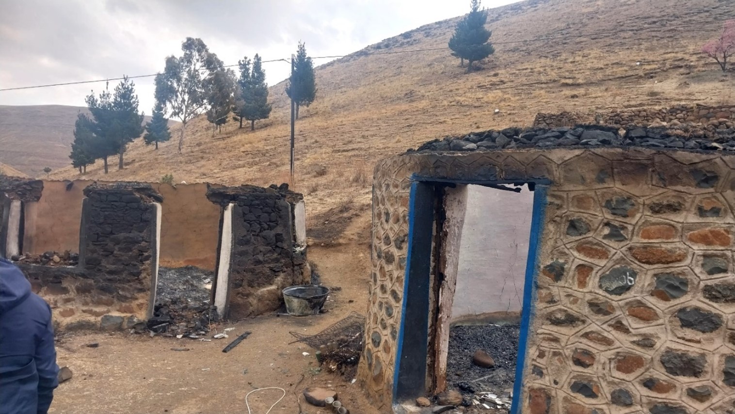 A heartbreaking view of the burned house, showcasing the devastating damage caused by the fire in Ha Rafolatsane.