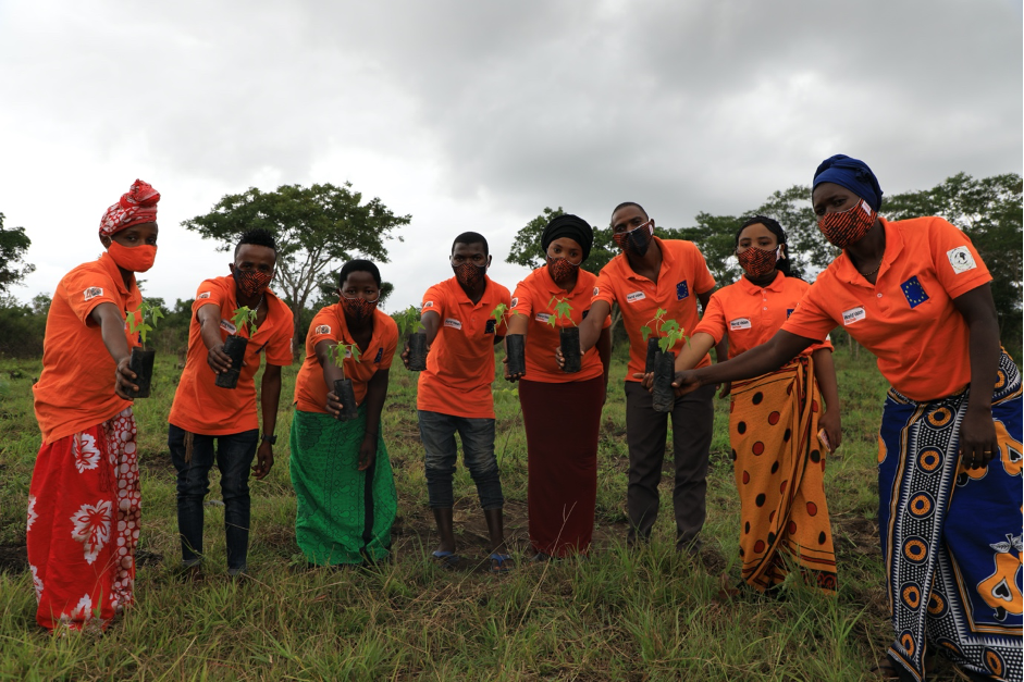 Some of members of Kwa Pamoja Tunaweza Youth Group pose for group photo at their 5 acres farm at Ugweno village.