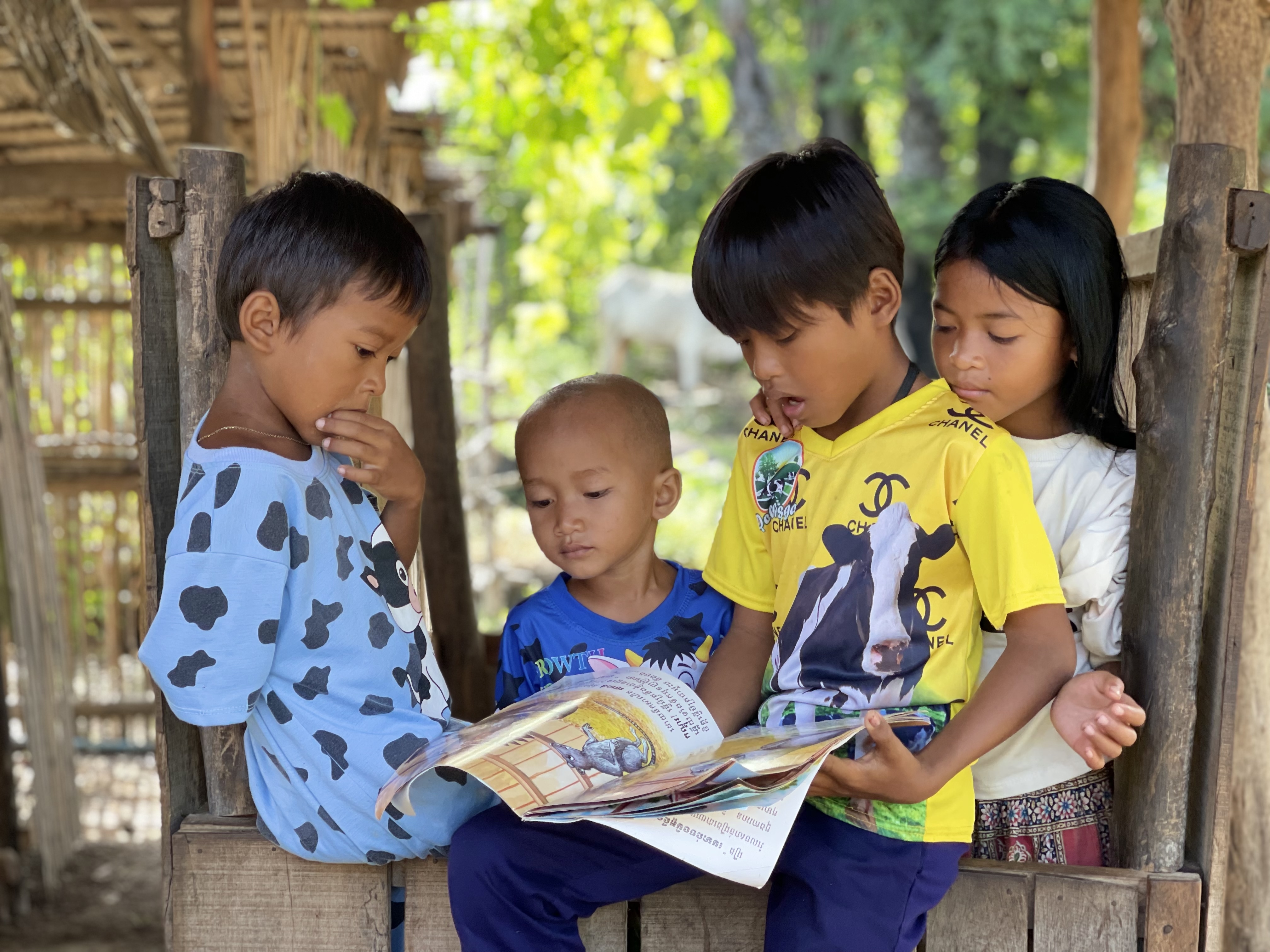 Children in Asia learning to read after school