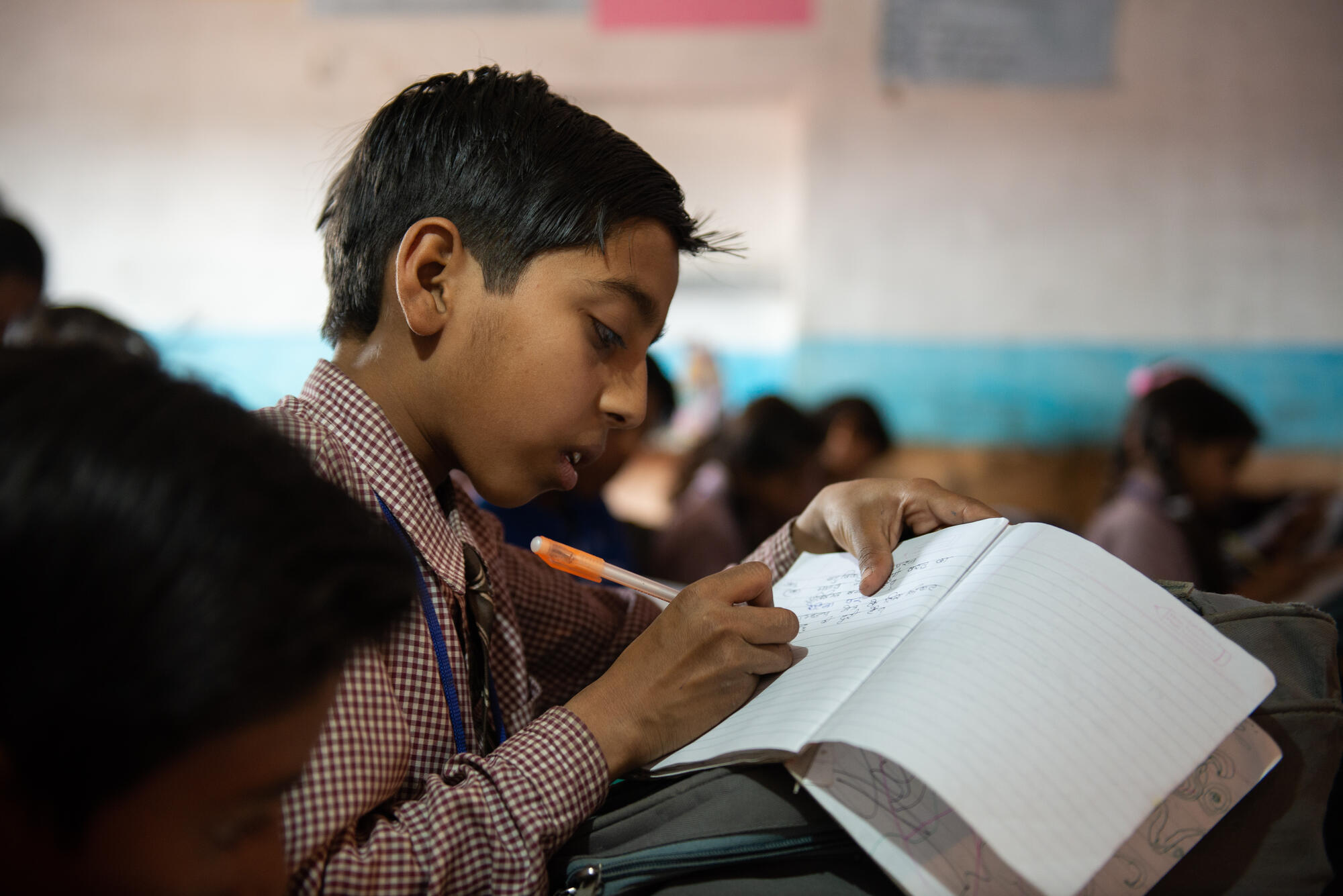 Boy studying in India