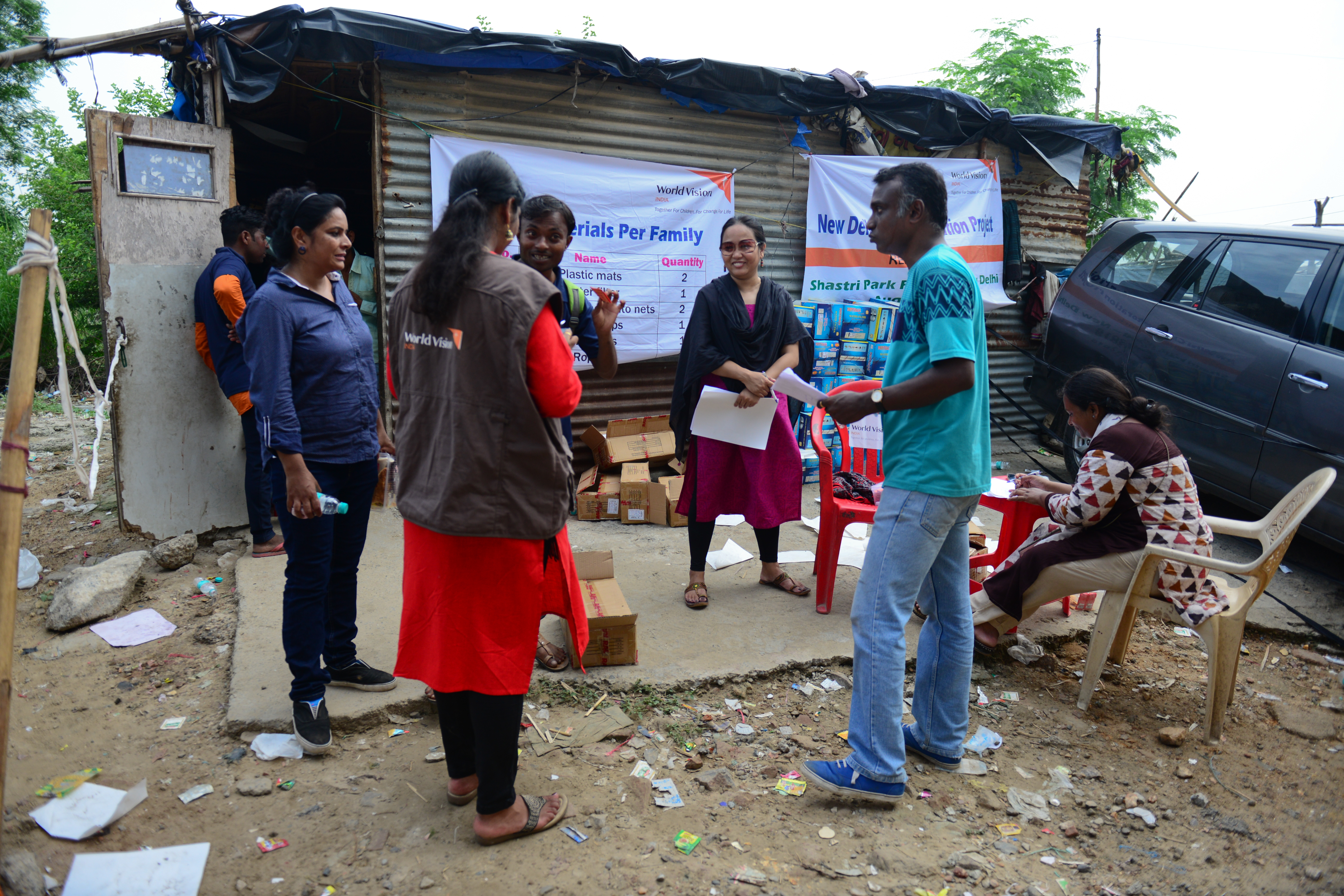 Mercy World Vision India staff talking to community members in Delhi