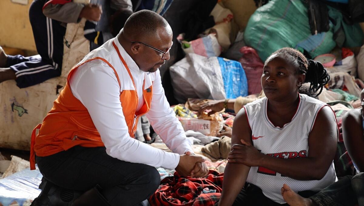 Director of Disaster Management at World Vision Kenya  providing moral support to the flood affected families