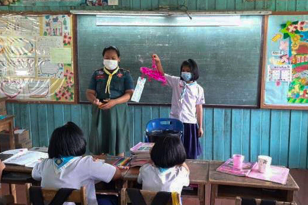 The school milk bag upcycling activity aims to repurpose waste by transforming it into useful products such as bags and garlands.