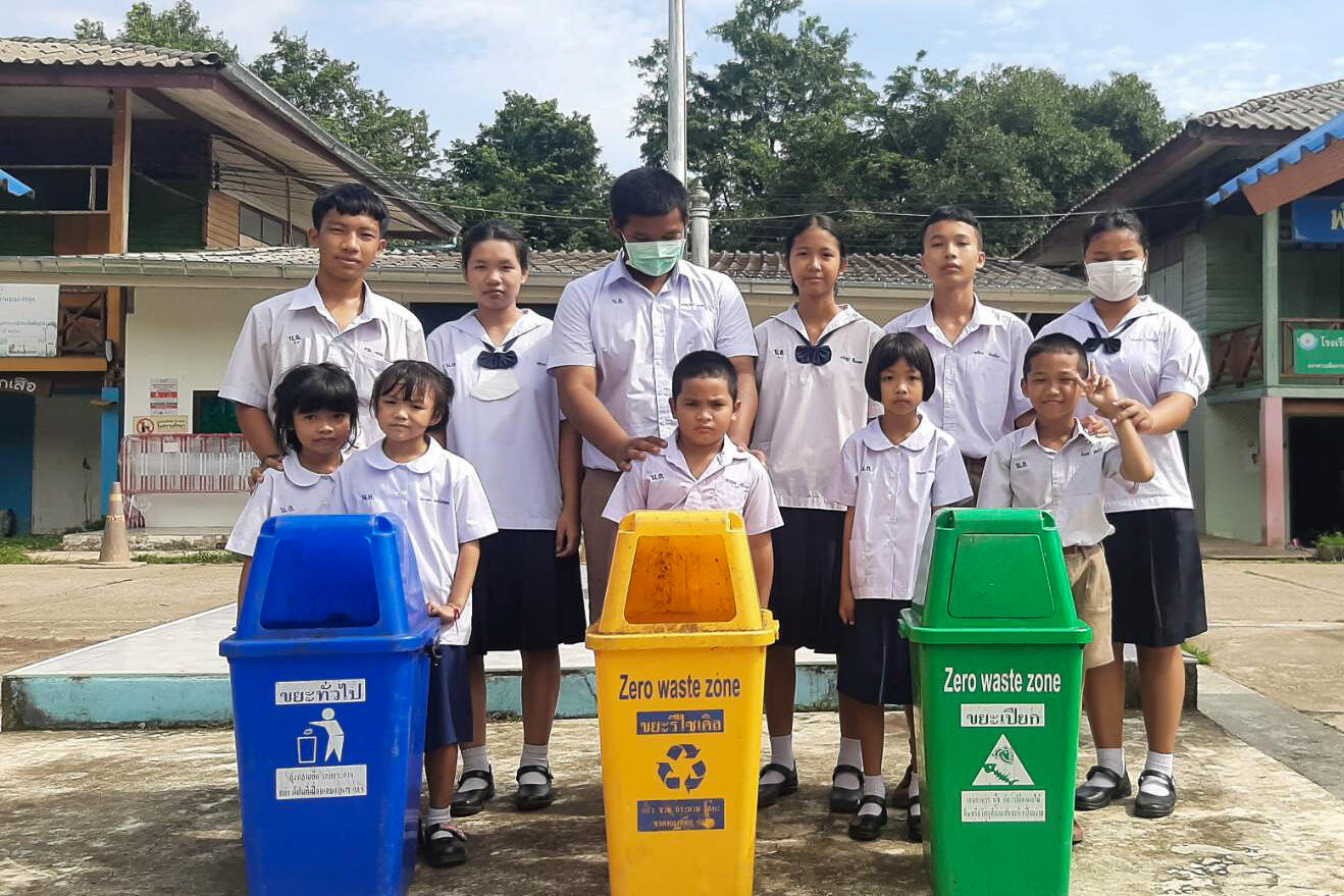 A demonstration on waste sorting, covering organic waste, recyclables, general waste, and hazardous waste