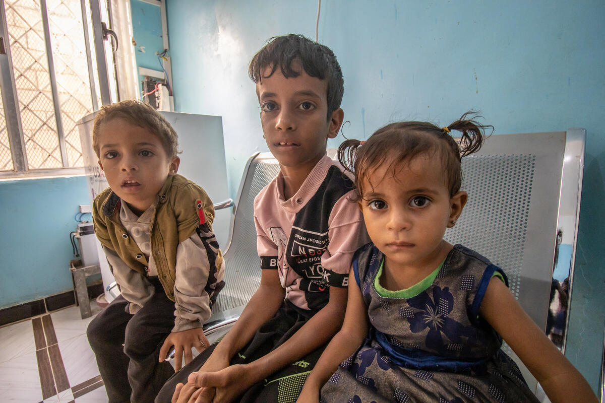 Above: Three children wait their turn for malnutrition examinations in Al Raha health centre, supported by World Vision and Medair in Yemen. / © World Vision 