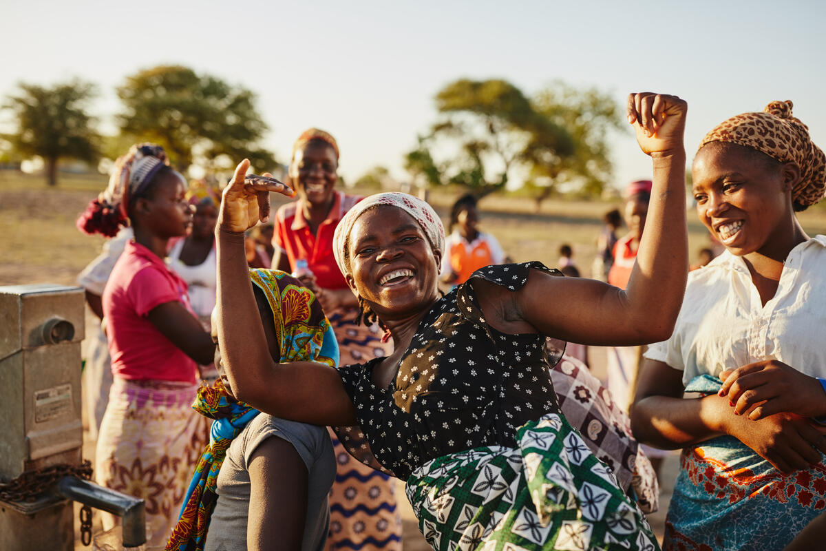 A woman dancing happily