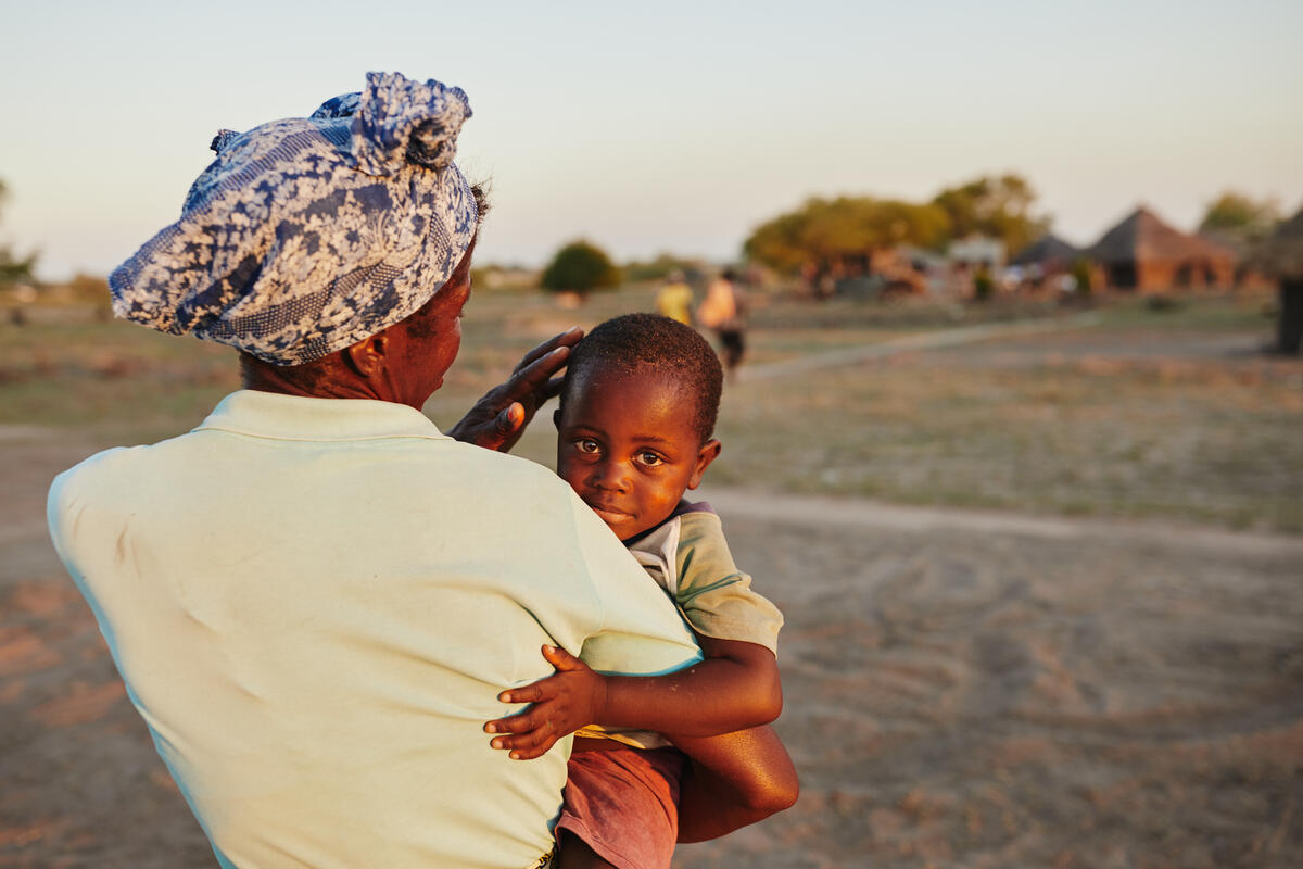 A woman holding her son