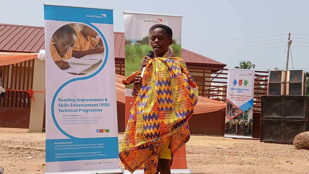 A child showcasing their talent at the inauguration of the new school facility.