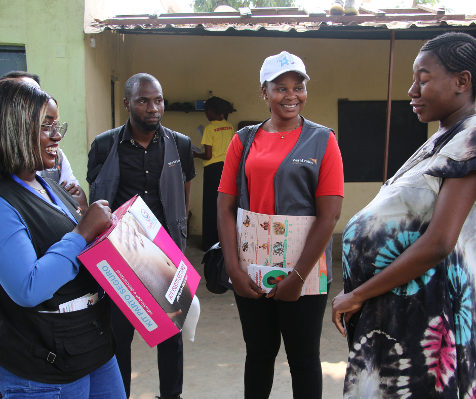 Pregnant woman receiving her maternity kit