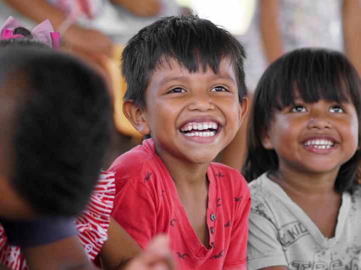 Two children smiling