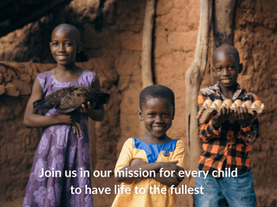 An image of three children smiling