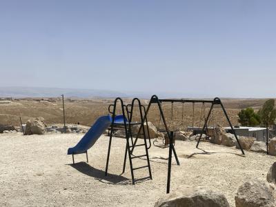 Seesaw with view on surrounding hills in the West Bank 