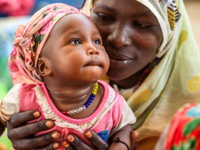 Mothers and children at the Farchana nutrition center.