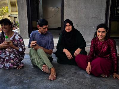 Naima with her three children who live with disabilities. Shayan Nuradeen. Photo credit:  Dastan Sabah & Ziryan Kamaran Sideq © World Vision 2024.