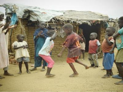 Child dancing in Sudan