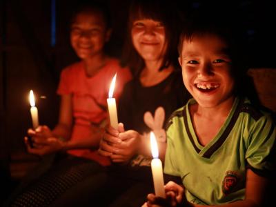 Myanmar children with candles