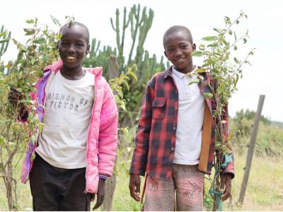 Lemayian (left) and Gideon (right) are young champions of ecological conservation in their community.